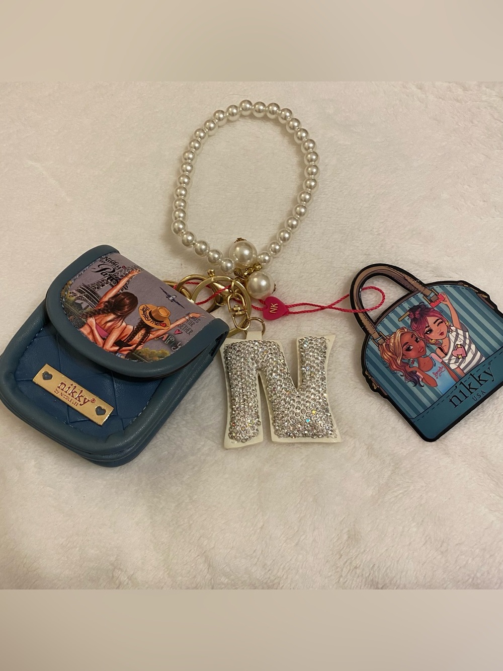 Nicole Lee Nikky headphone holder keychain